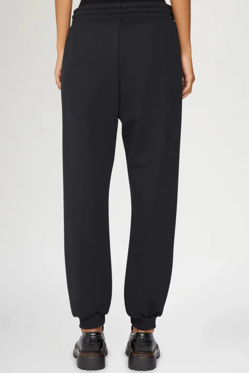 Pantaloni con logo