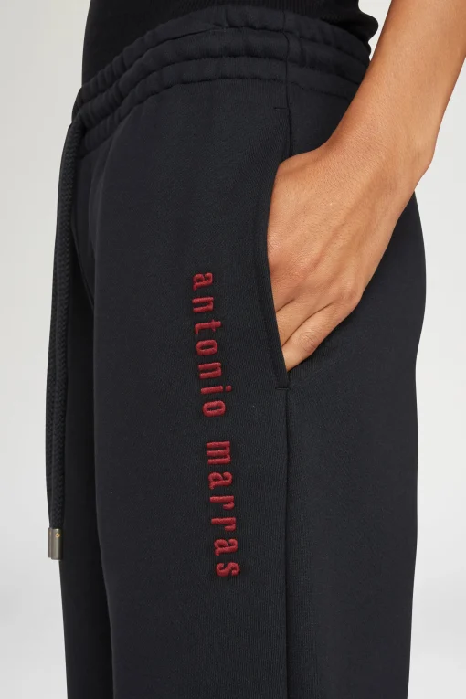 Pantaloni con logo